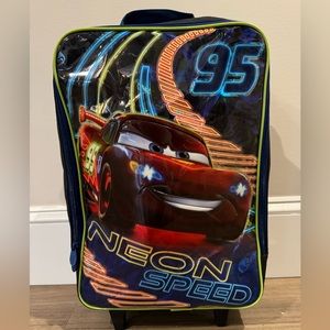 Disney Cars carryon suitcase on wheels with extending handle.